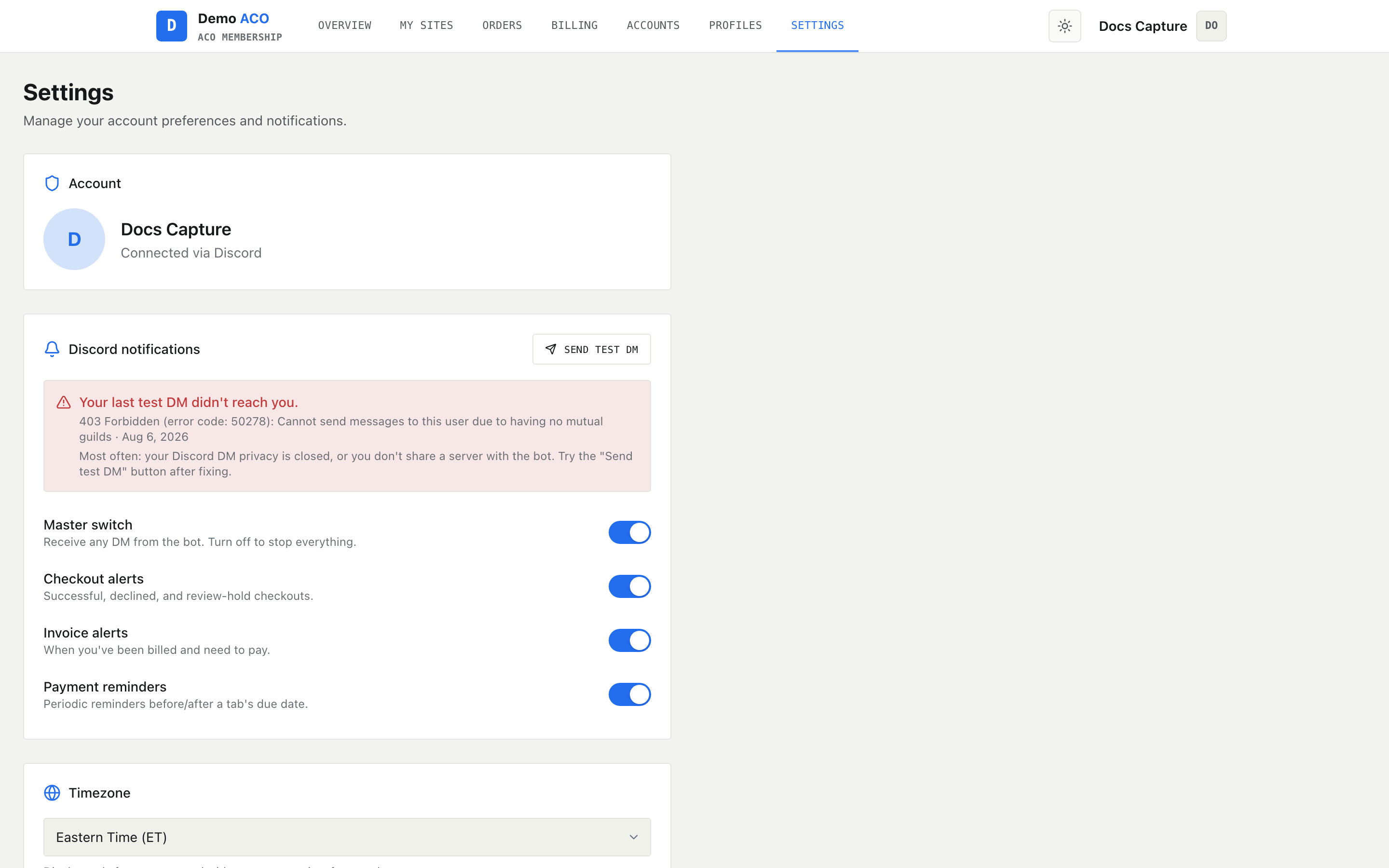 Settings page showing the account card, a Discord notifications panel with four toggles and a Send test DM button, and a timezone selector